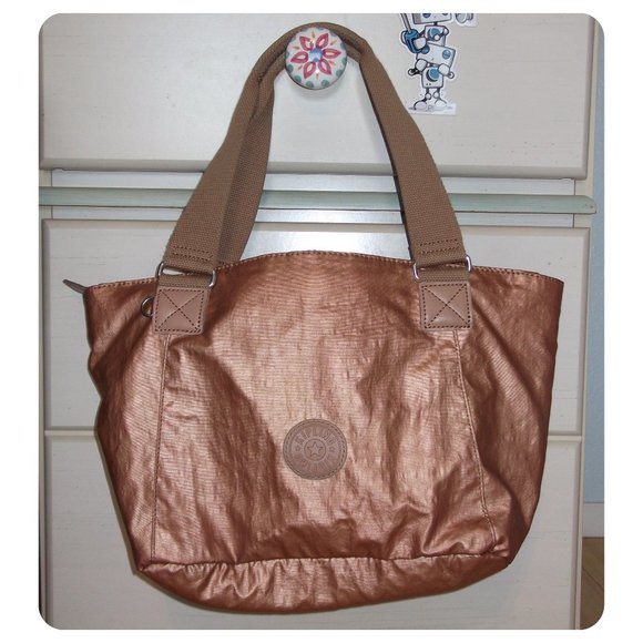 kipling toasty gold